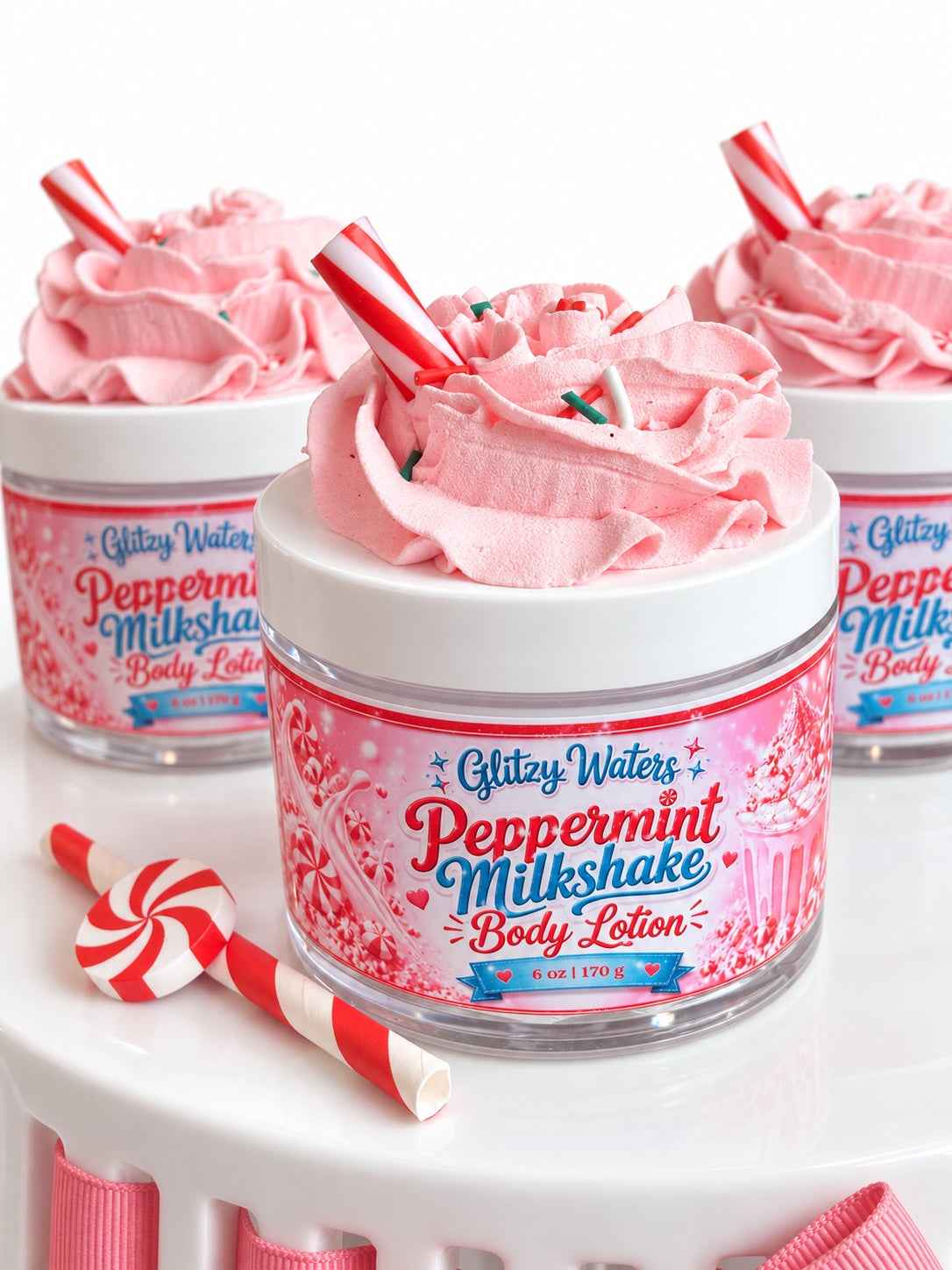 Peppermint Milkshake Body Lotion 6 oz by Glitzy Waters — pink lotion jar with whipped top and peppermint candy swirl